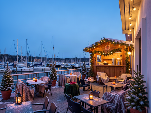 Nachher: Winter mit Glühweinstand Dieselbe Terrasse im Winter: Glühweinstand mit Lichterketten und Schnee